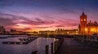 Cardiff Bay waterfront at sunset; illustrative photograph, not a photograph of the September 2026 summit.