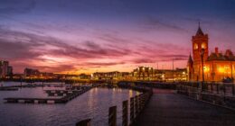 Cardiff Bay waterfront at sunset; illustrative photograph, not a photograph of the September 2026 summit.